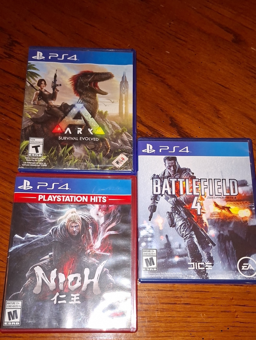 Sony PlayStation 4 Game Lot - ARK, Nioh, Battlefield 4 (CIB)